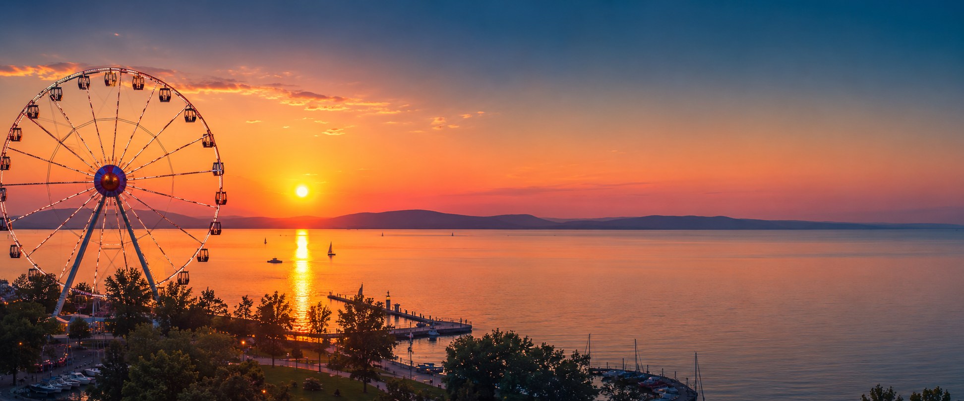 Siófok programok – naplemente a Balatonon a siófoki óriáskerékkel